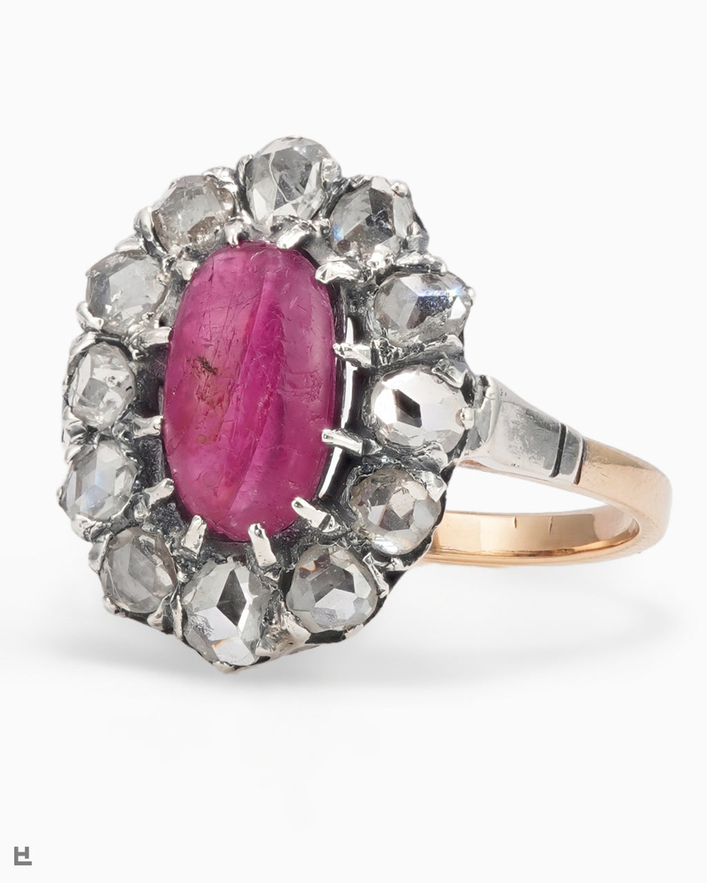 Victorian Ring with a Ruby Cabochon in a Wreath of Rose-Cut Diamonds