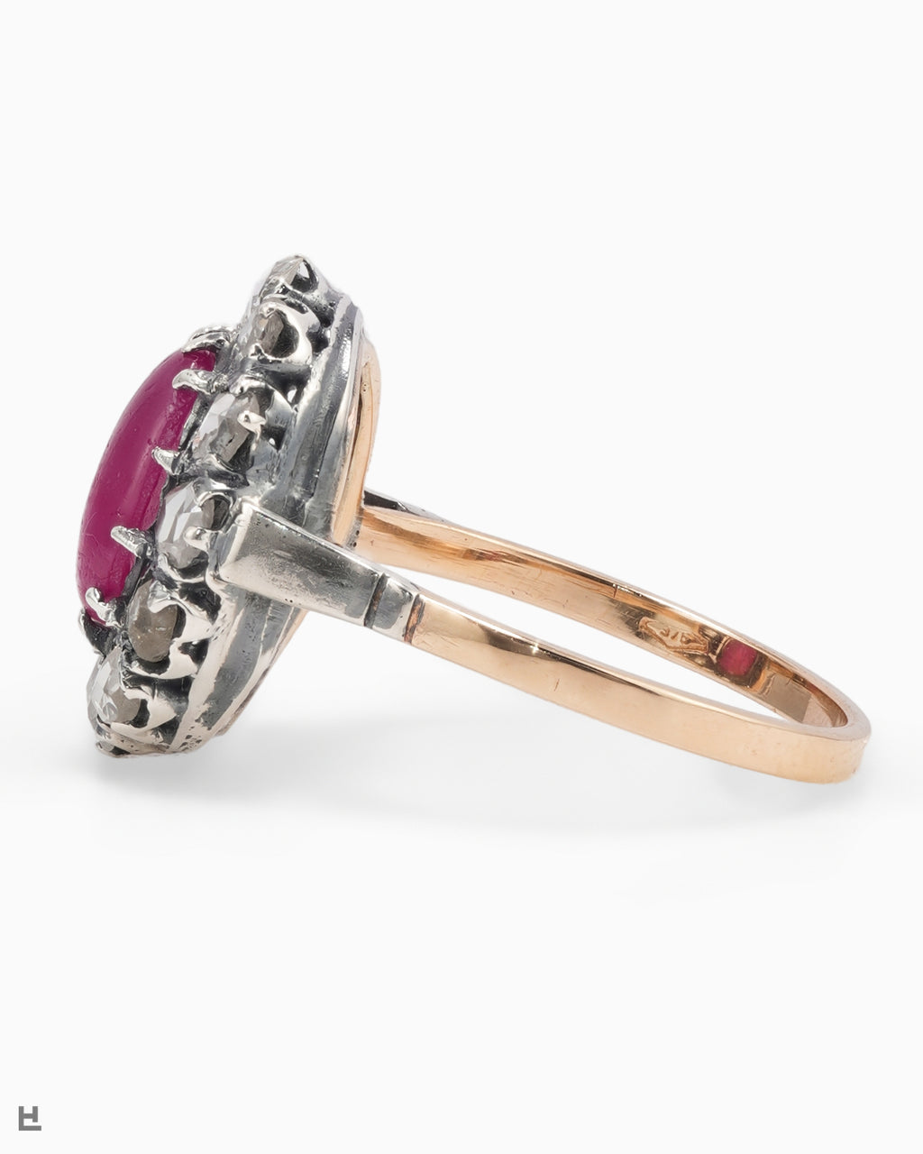 Victorian Ring with a Ruby Cabochon in a Wreath of Rose-Cut Diamonds