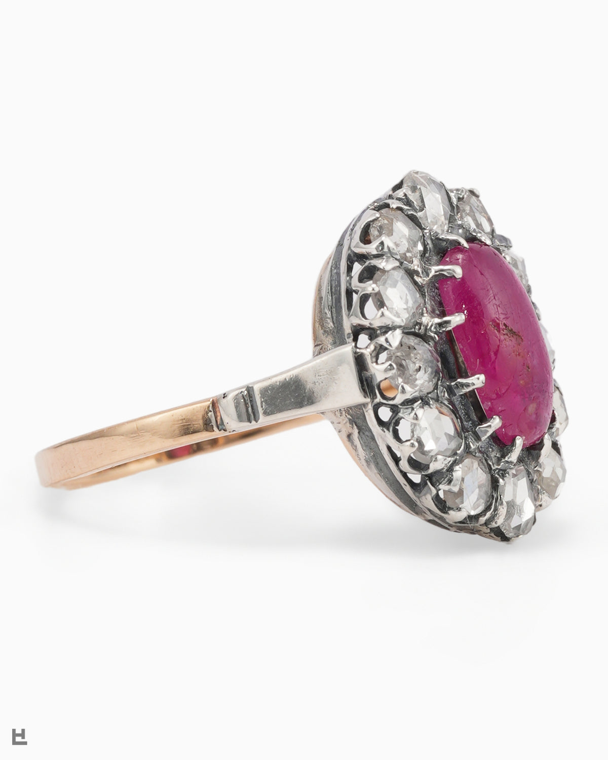 Victorian Ring with a Ruby Cabochon in a Wreath of Rose-Cut Diamonds