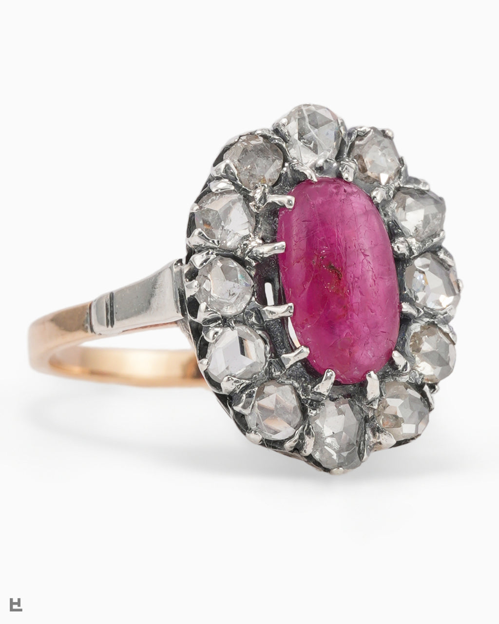 Victorian Ring with a Ruby Cabochon in a Wreath of Rose-Cut Diamonds
