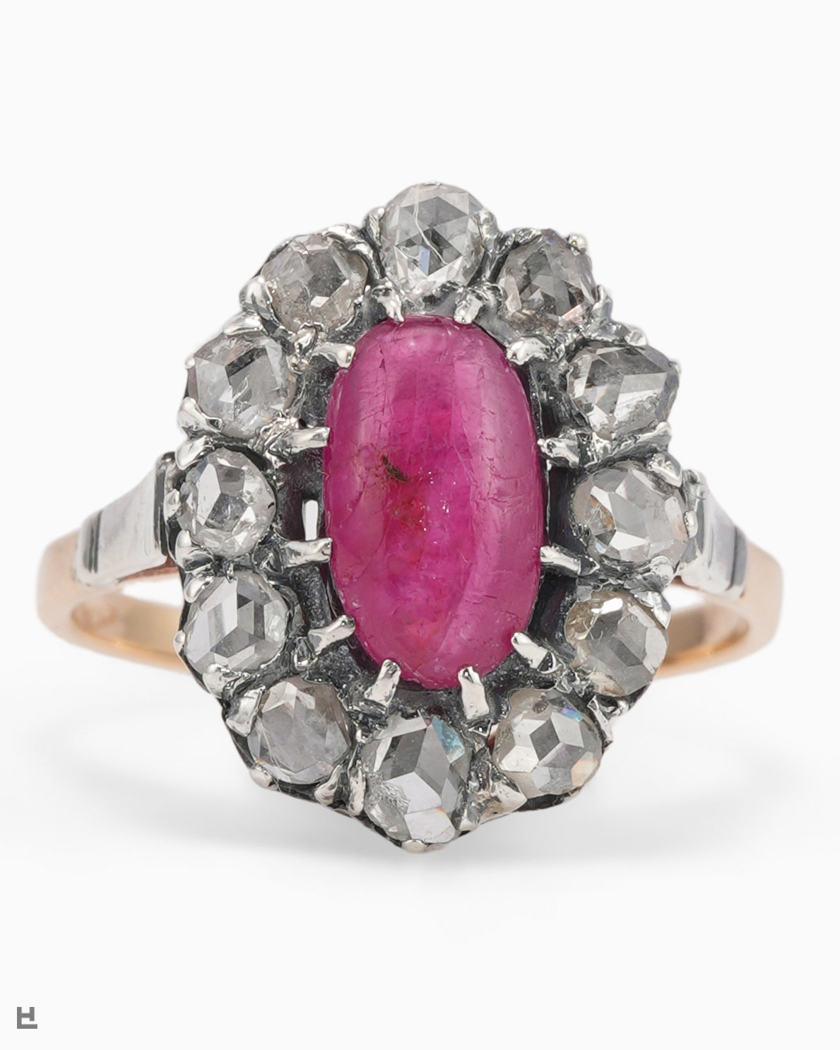 Victorian Ring with a Ruby Cabochon in a Wreath of Rose-Cut Diamonds