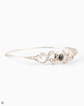 Enchanting and Elegant Bangle with Sparkling Accents in a Vintage Style